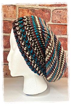 This hat was created with a medium-weight multicolor yarn.  It is worked in the round, from top to bottom.  This pattern provides instructions for four different adult sizes; small, medium, large, and extra-large.  Depending on the size of the hat, you will use approximately 3/4 skeins to 1 1/2 skeins of yarn and it will take approximately 4 1/2 - 6 1/2 hours to complete. Multicolor Slouchy Crochet Hat, Multicolor Crochet Slouchy Hat, Multicolor Slouchy Crochet Hat For Fall, Slouchy Multicolor Crochet Hat For Fall, Multicolor Slouchy Hat For Fall, Beret Hat Pattern, Slouchy Beret, Multicolor Yarn, African Hats