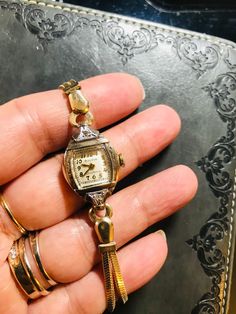 Year 1947(movement marked)  Bulova ~Excellency series A Fine Bulova Vintage Ladies watch (our ref M-29)   2 crown dainty real diamonds  21 rubies, (top precision movements of the time in 1947 & nowadays).  Perfect Dail !  14kGold 1/20 filled bracelet(rare new old stock )  &10K rolled gold case  Art Deco 1947 (movement hallmarked )  Oiled & Serviced - Winds and sets well and timekeeping Good(fit for daily wear like grandma  Signed Movement, dial , crown & case  Cosmetic condition: 98%new (minty )  Case size 20-22mm including winding button. Genuine antique- no rewrite of dail or mixed parts  Rare! Rare! Rare!  * For orders more than £500, ship by EMS/speedpost worldwide with no extra cost !  note : vintage watches / antique watches for more than 50 years ,  we will check before shipment for Vintage Bulova Watches Women, Vintage Watches Antique, Bulova Watches Women, Vintage Bulova Watches, Wristwatch Vintage, Art Deco Watch, Bulova Watches, Vintage Watches Women, Great Grandma