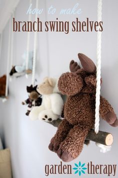 stuffed animals are hanging on the wall