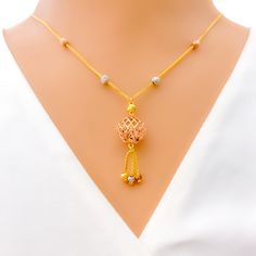 Embrace a blend of opulence and craftsmanship with this 22k gold necklace. Weighing in at 8.8 grams, its intricate netted design is brought to life by a harmonious blend of yellow, rose, and white gold finishes. The necklace, extending to an 18" length, features a delicate drop of 1.25". Securely fastened with a lobster lock, this piece promises to be a timeless addition to your collection. PRODUCT DETAILS Gold Purity(karat): 22k Gold Weight(grams): 8.8﻿ Item Finish: Yellow + Rose + White Gold N 22k Gold Necklace, Gold N, Yellow Roses, 22k Gold, Yellow Rose, Gold Finish, Gold Necklace, White Gold, Rose Gold