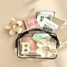 This cute bridal party kit would make the perfect bachelorette party gift bag filler, bridal party kit, bridesmaid gift bag, girls trip kit and more!  🤍 Included in entire gift set option:  * 1 chenille letter patch attached to outside of bag * 2 makeup remover wipes * 2 scented hand wipes * 1 silk scrunchie * 1 daisy flower hair claw clip * 1 black clear zipper bag with all items placed inside  * Color may vary slightly from computer screen, phone screen vs. in person  🤍 How to order: 1.) Sel Goodie Bags For Hair Clients, Bachelorette Party Kits, Bachelorette Hangover Kit, Bachelorette Party Gift Bag, Bridesmaid Proposal Diy, Weddings Idea, Flower Hair Claw, Leadership Summit