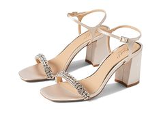 Jewel Badgley Mischka Lori - Women's Sandals : Champagne : A wedding night, or a bar night stay stunning wearing Jewel Badgley Mischka Lori heels. Man-made upper. Man-made lining. Man-made insole. Square open toe. Stunning crystals at the vamp, in three statement rows. Block heel. Buckle strap closure. Man-made sole. Imported. Weight of footwear is based on a single item, not a pair. Glamorous Almond Toe Sandals With 4-inch Heel, Elegant Champagne Sandals For Prom, Chic Almond Toe Wedding Sandals, Glamorous Sandals With Heel Loop For Events, Elegant Sandals With 4-inch Heel And Synthetic Material, Chic Wedding Sandals For Holiday, Glamorous Sandals With 4-inch Almond Toe Heel, Gala Sandals With Removable Insole And Almond Toe, Elegant Sandals With Reinforced Heel For Gala