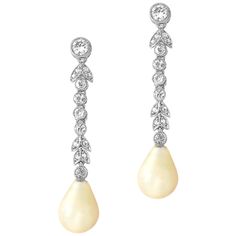 A pair of Edwardian pearl and diamond drop earrings, the natural saltwater drop shape pearls measuring approximately 11 x 8.3mm and weighing 4.28 and 4.73 carats, accompanied by a Gem & Pearl Laboratory certificate, suspended from an old- and rose-cut diamond-set foliate run, the diamonds all millegrain rubover-set in white, with screw fittings, circa 1910, the earrings measuring approximately 4 x 0.8cm, gross weight 5.49 grams. A Pair of Edwardian earrings in Good condition. Unmarked, metal tes Luxury Pear-shaped Pearl Drop Diamond Earrings, Luxury Pear-shaped Pearl Earrings, Luxury Pear-shaped Pearl Drop Bridal Earrings, Luxury Drop Pearl Earrings, Formal Drop Pearl Earrings, Exquisite Pear-shaped Pearl Earrings For Formal Events, Exquisite Pear-shaped Pearl Earrings For Formal Occasions, Teardrop Diamond Pearl Earrings For Evening, Pear-shaped Pearl Drop Diamond Earrings