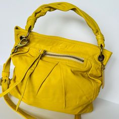 Questions? Leave A Comment Below! Coach Leather Bag Pre Owned 100% Leather Beautiful Color Yellow Button Snap As Closure Inside Zipper Interior Clean Exterior 2 Slight Marks Please Review Picture # 10 And Picture # 11 Shoulder Strap Adjustable Detachable Long Strap As Well This Bag Has Dual Straps Yellow Coach Satchel Shoulder Bag, Coach Yellow Satchel Shoulder Bag, Yellow Soft Leather Bag For Errands, Yellow Coach Shoulder Bag With Double Handle, Yellow Double Handle Coach Shoulder Bag, Coach Yellow Double Handle Shoulder Bag, Coach Satchel With Detachable Strap In Pouch Shape, Coach Yellow Double Handle Bag, Coach Double Handle Satchel For Everyday