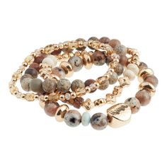 Add a touch of casual bohemian style to your wrist with our exclusive set of four coordinating stretch bracelets in a brown, blue and purple palette. Perfect for gifting to a loved one or sporting yourself, each strand showcases a unique mix of glass and semiprecious agate stone beads in a variety of shapes. Glistening gold accents mixed throughout give this coordinating jewelry set a dash of glamour. Bohemian Stretch Bracelet With Faceted Beads, Chunky Beaded Bracelets, Stretch Bracelet, Bohemian Stretch Bracelet With Round Agate Beads, Bohemian Agate Beaded Stretch Bracelet, Bohemian Brown Agate Beaded Bracelets, Stretch Beaded Bracelets Diy, Bohemian Hand-strung Agate Beaded Bracelets, Beads Bracelet Design