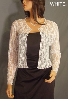 Comfortable and chic! Hip length Lace long sleeve bolero wedding jacket shrug. Perfect for anyone looking for a little extra coverage. Made From 40% Nylon & 60% Soft Rayon Lace Fabric To Give It A Nice Drape & The Stretchability To Last! Newly made in each size and ready to ship. VIEW PICTURES FOR SIZE AND MEASUREMENT CHART If you are needing more then four of this item just let us know. We are happy to offer VOLUME DISCOUNTS We keep several in each size in stock so that we can ship all Formal Spring Long Sleeve Shrug, Elegant Stretch Shrug For Spring, Spring Formal Fitted Shrug, Long Sleeve Shrug For Spring Evenings, Formal Long Sleeve Shrug For Fall, Long Sleeve Spring Evening Shrug, White Stretch Long Sleeve Shrug, Elegant Fitted Shrug For Parties, Elegant Long Sleeve Fall Shrug