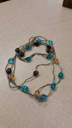 Boho Style, Blue, Gold and Brown Plastic Beaded, Triple Strand, 34 inch Necklace, Costume Jewelry, Fashion Accessory This is a nice find and very decorative. Priced to sell. Check out our shop for monthly specials. We have a variety of items for every taste. Combine several of our items together to save on shipping. If you have any questions please do not hesitate to ask. I will ship outside of the US, just request a quote. Happy Shopping. I will work around the priority mail price. Just send me your zip code and I will get a quote. As shop owners we will do our best to describe any issues or problems with our items. Since we do sell vintage and antiques there may be some flaws. Please check out the pictures very carefully and feel free to ask any questions. All sales are final. With any g Blue Bohemian Long Necklace With Colorful Beads, Bohemian Long Blue Necklace With Colorful Beads, Bohemian Blue Long Necklace With Colorful Beads, Blue Beaded Chain Bohemian Necklace, Blue Bohemian Beaded Chain Long Necklace, Blue Beaded Bohemian Long Necklace, Bohemian Blue Beaded Long Necklace, Long Blue Necklace For The Beach, Bohemian Blue Long Necklace With Faceted Beads