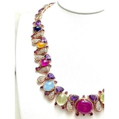 Bochic “Capri” Ruby, Sapphire,Amethyst, Aquamarine & Peridot Necklace in 18K Gold & Silver    Ruby - 31 Carats  Green Peridot - 11 Carats  White Topaz - 14 Carats  Sapphires - 4 Carats  Purple Amethyst -11 Carats    The Bochic "Capri" Opal & Multi Fancy Gems Necklace is Set in 18K Gold & Silver is a stunning piece of jewelry designed for versatility and elegance. It features natural gems cabochons weighing 71 carats, showcasing pink, blue, and cream tones. The Necklace also includes natural multi-color fancy Gems.  Crafted in 18K gold and 950 silver, this necklace is a combination of luxury and craftsmanship. The piece is designed to disassemble and can be worn as pendants or brooches, thanks to its open and close clasp and safety hook. It is ideal for transitioning from day to night, maki Elegant Multicolor Cabochon Gemstones, Luxury Amethyst Necklace With Jewels, Luxury Amethyst Jewel Necklace, Luxury Amethyst Jewel Necklaces, Elegant Multicolor Cabochon Necklaces, Luxury Multi-stone Purple Jewelry, Luxury Multicolor Amethyst Gemstones, Luxury Purple Multi-stone Jewelry, Luxury Amethyst Multi-stone Jewelry