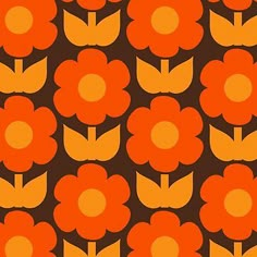 an orange and brown flower pattern is shown on a dark background with smaller flowers in the center