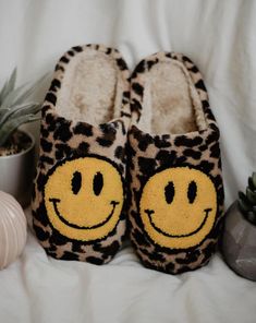 We love these fluffy leopard happy face slippers and your friends will, too! Our slippers are made from faux sherpa fur for an ultra-soft feel and feature a thick stiff bottom sole to ensure slip-free comfort. Featuring a neutral brown leopard print that's super cute and chic! // Leopard Print Smiley Face Sherpa Slippers | Women's Slippers | Best Gift 2022 | Valentine's Day Gift | Valentine Slippers | Katydid Slippers | Happy Face Slippers | Best Valentines Day Gift 2022 | Manifesting Daydreams Happy Face Slippers, Sherpa Slippers, Smiley Face Slippers, Leopard Print Gifts, Nb Shoes, Trendy Slippers, Leopard Slippers, Animal Slippers, Preppy Shoes