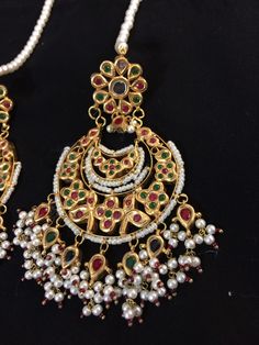 chandbali made using kundan and 22 carat gold plated ear supports included Multicolor Kundan Danglers With Intricate Design, Multicolor Bollywood Bridal Earrings With Intricate Design, Multicolor Chandbali Earrings With Stone Work, Multicolor Chandbali Jhumkas With Intricate Design, Multicolor Chandbali Bridal Earrings With Intricate Design, Multicolor Hand Set Chandbali Earrings, Multicolor Hand-set Chandbali Earrings, Multicolor Intricate Chandbali Bridal Earrings, Multicolor Kundan Chandbalis With Intricate Design