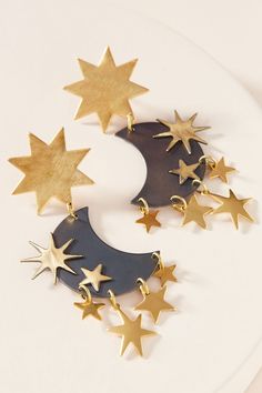 An inky patina moon serves as the perfect backdrop for golden celestial shapes. Sterling posts. Nickel and lead free. 3” [7.65 cm] long. Bubble House, Metalsmithing Jewelry, Bhldn Weddings, Color Crafts, Celestial Jewelry, Metal Crafts, Acrylic Earrings, Holiday Gift Guide, Cute Jewelry