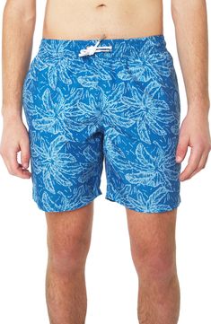 Hit the beach in bold style in these brightly patterned board shorts that are topped with a comfy drawstring waist. 6" inseam (size Medium) Elastic/drawstring waist Side-seam pockets; back flap pocket Partially lined 100% polyester Machine wash, dry flat Imported Summer Vacation Printed Swim Trunks, Blue Tropical Print Beachwear Shorts, Casual Swim Trunks For Vacation, Casual Printed Beach Bottoms, Printed Swim Trunks For Poolside Vacation, Vacation Swim Trunks Printed For Poolside, Printed Swim Trunks For Vacation, Casual Swim Trunks For Beach Season, Casual Swim Trunks For Vacation In Warm Weather