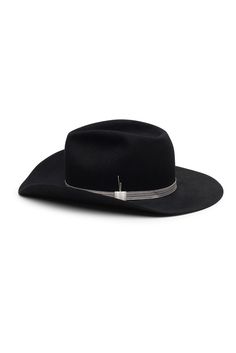 LIMITED EDITION – Discover our black fedora and cowboy hat hybrid Midnight Verve, a Western-inspired hat that combines the structured crown of a classic fedora with the bold, flanged brim of a cowboy hat. This unique piece features a striking silver band detail, repurposed from vintage royal uniforms, adding a touch of timeless elegance to its daring design. Midnight Verve captures perfectly the blend of rugged charm and regal allure. Each hat is handcrafted in our Stockholm studio, ensuring exc Western Style Formal Top Hat With Flat Crown, Western Style Formal Hat For Kentucky Derby, Western Style Formal Top Hat With Flat Brim, Elegant Black Hat Band For Ranch, Black Fedora With Flat Crown For Country Events, Western Style Fedora With Flat Crown, Classic Black Fedora For Country Events, Western Style Top Hat With Curved Brim, Western Wide Brim Top Hat For Formal Occasions