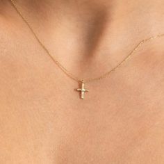 Real 14k Solid Gold Crucifix Pendant Jewelry | Dainty Diamond Cross Necklace for Women | Genuine Diamond Religious Choker Gift for Christmas This tiny cross necklace is made from 14k solid gold and attached with a diamond at the center of it. It is a perfect example of minimalist jewelry.  If you're looking to purchase only the pendant option, we will include a jump ring at the top of the pendant. This jump ring is compatible with chains that have a width of less than 3mm/0.12 inch. If you require any additional customization for your chain, please don't hesitate to contact us. We're always happy to help. 14K SOLID GOLD is crafted through a meticulous process where gold is melded with other precious metals, forming a blend that results in a piece that radiates with the pure golden hue, a h Real Gold Cross Necklace For Women, Cheap Gold Minimalist Cross Necklace, Diamond Cross Pendant Necklace Woman, Dainty Cross Necklace Gold, Cute Cross Necklace, Golden Cross Necklace, Small Diamond Cross Necklace, Cross Necklace For Women, Tiny Cross Necklace