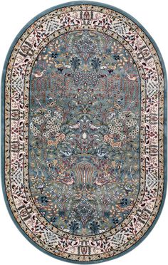 a blue rug with an ornate design on the center and sides, in various colors