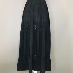 Mexican Artisanal Skirt - One Size (S/M) - Black Artisanal Skirt Made In Oaxaca, Mexico, With Elastic On The Waist. (There May Be Some Variations In The Color Depending On The Brightness Of Your Screen). Fabric: Manta Black Dress With Relaxed Gathered Skirt, Black Dress With Gathered Relaxed Skirt, Black Dress With Gathered And Relaxed Skirt, Black Bohemian Maxi Skirt For Summer, Bohemian Black Maxi Skirt, Bohemian Black Flowy Maxi Skirt, Black Bohemian Dress With Tiered Skirt, Flowy Black Bohemian Maxi Skirt, Summer Black Cotton Maxi Skirt