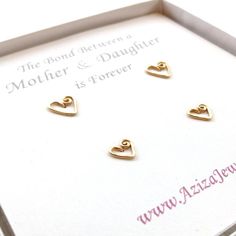 Mother Daughter heart earrings set.14k Gold heart studs- one for mom and one for daughter. Perfect gift for a new mom or as a push present. Select 14k solid gold for sensitive new born ears or if you require minimal care for your jewelry that will last a lifetime or wish to wear it in the shower or pool.Join my mailing list to find out about sales and new collections: http://eepurl.com/gLcTn Personalized Earrings For Mother's Day, Mother's Day Gift Earrings With Heart Charm, Yellow Gold Heart Earrings For Anniversary And Mother's Day, Yellow Gold Heart Earrings For Mother's Day Anniversary, Yellow Gold Heart Earrings For Anniversary On Mother's Day, Personalized Heart Earrings For Mother's Day, Sterling Silver Earrings For Anniversary And Mother's Day, Sterling Silver Earrings For Mother's Day Anniversary, Sterling Silver Earrings For Mother's Day