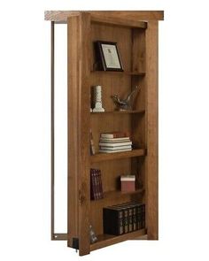 an open bookcase with books on it and some other items in the shelf next to it