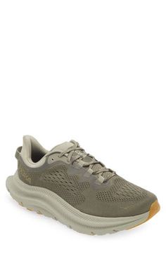 This all-purpose training shoe is updated with a single-layer mesh upper, a sock-like bootie and ghillie lacing to deliver a secure, well-balanced ride. The speckled regrind midsole and gum-rubber outsole are designed for lateral side-to-side movement so you easily transition from street to studio floors. Neutral: provides soft, even cushioning with an emphasis on comfort during any activity Lace-up style Removable insole Textile and synthetic upper/synthetic lining and sole Imported Gray Lace-up Running Shoes For Trail Running, Gray Lace-up Hiking Running Shoes, Gray Lace-up Trail Running Shoes For Athleisure, Gray Running Shoes With Rubber Sole For Casual Use, Gray Running Shoes With Rubber Sole, Green Running Shoes For Hiking, Athleisure Trail Running Shoes With Laces, Gray Running Shoes With Rubber Sole For Outdoor Activities, Mesh Trail Running Shoes With Rubber Sole For Hiking