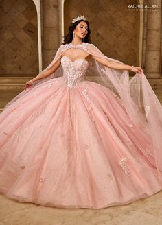 Make an impact in this embroidered applique long strapless cape dress with A-line skirt by Rachel Allan RQ1162. The sweetheart bodice, intricately beaded and adorned with shimmering appliqué details, enhances your natural elegance. With a detachable bodice liner, this gown is perfect for quinceañeras or grand celebrations, ensuring you radiate grace and beauty on your special day. Strapless Cape Quinceanera Dress by Rachel Allan RQ1162 Rachel Allan Carmina Collection: Spring 2025 Style Number: R Quinceanera Dresses Light Pink, Quince Photoshoot, Strapless Ball Gown, Long Ball Gown, Tulle Applique, Quinceñera Dresses, Mary's Bridal, Debutante Ball, Long Cape