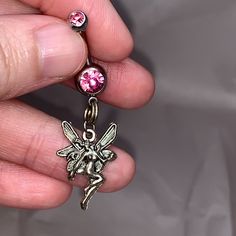 I Have Two Different Designs Of Fairy Charms. One Looks Like Tinkerbell The Other Is A More Intricate Fairy Design. This Listing Is For The Regular Fairy Design, Not The Tinker Bell One. It Has 2 Gems Both In A Medium Pink. The Charms Are Made Out Of Pewter, The Belly Rings Themselves Are 316-L Surgical Steel. I Use A Split Ring In Order To Attach The Charms So You Don't Lose Them. Each Belly Ring Is 14 Gauge. Some Of My Belly Rings Come With A Gemmed Top Ball, Some Do Not. I Do Have Extra Gemme Unique Belly Rings, Cute Belly Rings, Fairy Design, Fairy Stuff, Hollow Earrings, Fairy Charms, Dangle Belly Rings, Fairy Jewelry, Crystal Choker Necklace