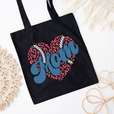 Looking for a cute tote bag to carry all your essentials this summer? This cute Baseball Mom Heart bag will be perfect to add to your collection. Perfect for a day at the beach or every day life! Heart Canvas, Cute Tote Bags, Heart Bag, Baseball Mom, Canvas Tote, Baseball, Tote Bag, Canvas, Black