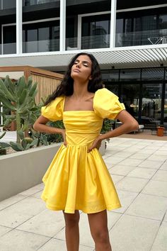 A delicate midi-length dress with the most feminine "godet" silhouette skirt in Yellow. Drapery on the bodice line is designed to ensure your look to be joyful and romantic. The garment has a fitted cut and puffy sleeves. The dress favorably emphasizes the silhouette, tightly fitting the hips, expanding to the bottom. The dress will make you feel the prettiest and good looking ever. Yellow Dress With Sleeves, Neon Yellow Dress, Neon Yellow Dresses, Draped Bodice, Be Joyful, Satin Long Sleeve, Hoco Dresses, Puffy Sleeves, Midi Length Dress