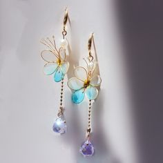 Transparent resin flower earrings Elegant Dangle Resin Earrings, Elegant Resin Dangle Earrings, Elegant Resin Drop Earrings, Elegant Resin Flower Earrings, Elegant Resin Flower-shaped Earrings, Elegant Resin Flower Shaped Earrings, Elegant Resin Earrings With Flower Charm, Elegant Resin Earrings As Gift, Elegant Blue Resin Earrings