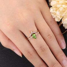 Unique Peridot Engagement Ring Set Dainty Green Gemstone Rose - Etsy Peridot Engagement Ring Silver, Peridot Wedding Rings, Green Stackable Wedding Rings Fine Jewelry, Green Heart Cut Rings For Wedding, Green Heart Cut Wedding Rings, Heart Cut Diamond Emerald Ring For Wedding, Green Stackable Rings With Round Cut For Weddings, Green Heart Cut Jewelry For Wedding, May Birthstone Wedding Ring In Cubic Zirconia