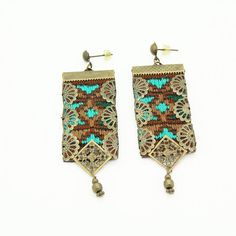 Embroidered earrings, Oriental earrings, Embroidered Jewelry, Embroidered earrings, Ethnic earrings, Christmas gift idea Welcome to my handmade jewelry store inspired by my Iranian origins. 7 cm Beautiful pair of oriental earrings. Perfect for every day, these earrings will add even more light to your face! Persian inspiration, enamel and brass Made in France All my jewelry is well packaged :) Handmade Rectangular Jewelry For Festive Occasions, Brown Rectangular Bohemian Earrings, Bohemian Brown Rectangular Earrings, Handmade Festive Turquoise Earrings, Handmade Turquoise Earrings For Festive Occasions, Festive Handmade Turquoise Earrings, Unique Beaded Earrings For Festive Occasions, Unique Festive Beaded Earrings, Handmade Green Chandelier Earrings For Celebration