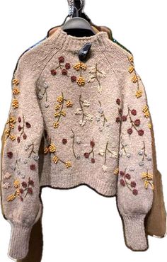 Embellished Crew Neck Sweater For Fall, Winter Embellished Long Sleeve Cardigan, Beige Long Sleeve Sweater With Floral Embroidery, Embroidered Crew Neck Cardigan For Fall, Long Sleeve Embellished Cardigan For Winter, Embellished Long Sleeve Cardigan For Winter, Casual Winter Sweater With Floral Embroidery, Winter Crew Neck Cardigan With Floral Embroidery, Winter Cardigan With Floral Embroidery And Crew Neck