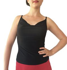 "Classic, all-around cami showcases your fabulous skirts and pants. Draped front and back necklines. Partially lined bodice. 5\" spaghetti straps work with most bras. Item #TL202. Soft, silky and stretchy poly/spandex jersey. Size: -Sizes 4 through 16 Fabric & Care: -Easy care, no-wrinkle poly/spandex -Hand wash cold. Hang dry. Overview: -Great for travel - rolls up small. -Handmade in our studio in Santa Fe, New Mexico USA. Questions about fabric, fit or size? Email me. I am delighted to he Chic Camisole With Lined Body And Spaghetti Straps, Fitted Camisole With Built-in Bra For Evening, Fitted V-neck Top With Lined Body, Elegant Tank Top With Built-in Bra And Wide Straps, Black Tops With Built-in Bra And Fitted Bodice, Stretch Sleeveless Halter Top With Built-in Bra, Stretch Camisole With Lined Body And Spaghetti Straps, Bra-friendly Fitted V-neck Tank Top, Party Camisole With Spaghetti Straps And Lined Body