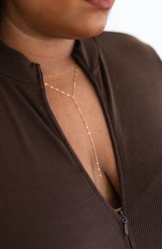 Perfect for layering, stunning oval links shine along this Y-necklace for a delicately beautiful day-to-night accessory. 20" length; 5" drop Lobster clasp closure 14k-gold fill or sterling silver Made in the USA Elegant 14k Gold-filled Oval Link Necklaces, Elegant 14k Gold Filled Oval Link Necklace, Elegant Gold Y-shape Chain Necklace, Elegant Y-shaped Gold Chain Necklace, Minimalist Gold Lariat Body Chain, Elegant Lariat Chain Necklace With Paperclip Chain, Elegant Lariat Necklace With Paperclip Chain, Minimalist Delicate Lariat Body Chain, Elegant Lariat Paperclip Chain Necklace