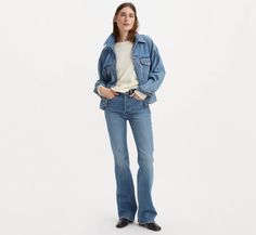 Fall Denim Flare Jeans With Standard Cut Leg, Denim Flare Jeans For Fall, Fall Standard Cut Denim Flare Jeans, Fitted Light Wash Flares For Fall, Retro Dark Wash Flare Jeans For Fall, Retro Relaxed Fit Mid-rise Flare Jeans, Medium Wash Retro Pants For Fall, Trendy Levi's Dark Wash Flare Jeans, Retro Medium Wash Pants For Fall