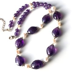 "THIS LISTING IS FOR THE NECKLACE ONLY Earrings shown for illustration and listed separately MATERIALS & DIMENSIONS ✦ Natural AMETHYST, deep purple, faceted ovals approx. 16x14mm, round beads 6mm; ✦ Freshwater PEARLS, white, round approx. 7|5mm; ✦ STERLING SILVER bead caps, crimps, jump rings and lobster claw clasp with 2\" inches extender chain; ✦ Total circumference length is about 16\" inches (41cm), plus 2\" inches extension; ✦ You will receive shown necklace; PACKAGING & SHIPPING ✦ Your necklace will arrive nicely packaged in a jewelry box with a ribbon, perfect for gift giving or treating yourself; ✦ \"Gift Wrap\" option is available during checkout - we will attach \"A Gift for You\" card with an optional note from you; ✦ Receipts and prices are not included with orders marked as \" Anniversary Purple Jewelry With Natural Stones, Purple Jewelry With Natural Stones For Anniversary, Purple Round Bead Necklace For Formal Occasions, Elegant Necklaces With Round Amethyst Beads, Elegant Purple Jewelry With Round Beads, Purple Jeweled Necklace, Elegant Purple Gemstones For Jewelry Making, Purple Jewelry With Jewels As Gift, Purple Costume Jewelry As Gift