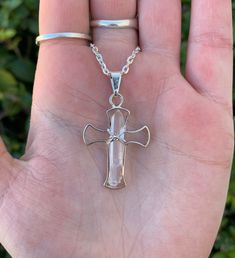 This listing is for one clear quartz cross necklace. Quartz is a transparent stone that is colorless but can also have a milky hue. It is typically found in crystal form either as a crystal point, or still attached to its matrix. It was discovered in ancient times. Quartz translates from German to mean hard. Quartz is a stone that helps amplify other stones and is often referred to as a universal crystal. It helps to clear the mind and bring tranquility and peace. This stone is said to bring the Spiritual Wire Wrapped Cross Pendant Necklace, Spiritual White Cross Jewelry, Spiritual Clear Crystal Pendant Necklace, Spiritual Wire Wrapped Crucifix Jewelry, White Cross Necklace As A Gift, Spiritual Clear Quartz Jewelry, Wire Wrapped Cross Jewelry For Gift, Wire Wrapped Cross Pendant Necklace As Gift, Wire Wrapped Cross Pendant Necklace For Gifts