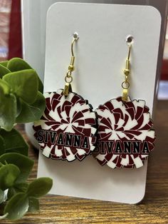 Each pair of earrings (price listed is for per pair) are personally laser cut, in Wisconsin, with 1/8" thick hardwood and colors/images are permanently applied. Image will not rub off and NOT decals. Will use the earrings for years to come, **BUY TWO OR MORE ITEMS: use Code: SAVE20 for 20% your order** (Only 1 promo code allowed on single order) More earrings/items are available https://www.etsy.com/shop/KnightDayCustom How To Order Submit order and if your item requires a photo, please send us a message of image(s) after order is placed.  If you want personalization or customization, please include in the personalization section of the order. Dangle size is roughly 1.45" Stud Earring size is roughly 0.85" Size Not including the hardware. *Sizes are approximate they may vary slightly as th Personalized Red Drop Earrings, Personalized Red Dangle Earrings, Personalized White Drop Earrings, Cheerleading Earrings, Cheerleader Gift, Dance Earrings, Mom Earrings, Pom Earrings, Cheerleading Gifts