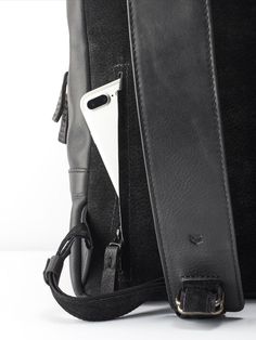 Bisonte Laptop Backpack · Black by Capra Leather Modern Leather Backpack For Travel With Cell Phone Pocket, Modern Leather Backpack With Cell Phone Pocket For Travel, Modern Leather Travel Backpack With Cell Phone Pocket, Leather Bags With Cell Phone Pocket For Commuting, Leather Backpack With Cell Phone Pocket For On-the-go, Modern Leather Backpack With Adjustable Strap For Everyday, Rectangular Backpack With Cell Phone Pocket For Everyday, Everyday Rectangular Backpack With Cell Phone Pocket, Leather Laptop Bag With Zipper Pocket For Commuting