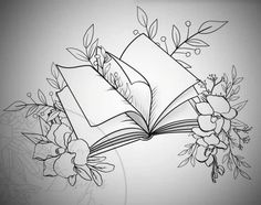 an open book with flowers and leaves around it