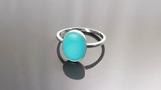 Simple and Chic in Design, this Sterling Silver Round Ring is set with a Beautiful Turquoise Stone. All our stones are hand selected for best quality assurance, then precisely sawed, and shaped into the desired geometry. The stones are then delicately grinned, sanded and hand polished to make sure the jewelry have the perfect aesthetic. ► DIMENSIONS : * Ring size : 10mm X 7mm * Silver weight: 1.3 gr. ► PRODUCTION METHOD:  💓 Handmade with Love and Care 💓 ► MATERIALS: * High Quality High Quality Modern Turquoise Round Ring, Minimalist Turquoise Jewelry For Anniversary, Turquoise Minimalist Jewelry For Anniversary, Turquoise Aquamarine Birthstone Ring, Blue Minimalist Aquamarine Jewelry, Modern Oval Turquoise Ring As Gift, Handmade Turquoise Aquamarine Ring, Modern Blue Turquoise Gemstone Ring, Turquoise Cabochon Opal Ring For Gift