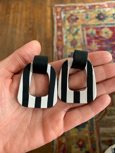 Striped black and white pounder clay earrings. Door knocker style. Beetlejuice Earrings, Striped Door, Door Knocker Earrings, Aztec Earrings, Glow Forge, Amanda Jones, Pastel Earrings, Heavy Earrings, Door Knocker