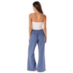 Getting dressed just got easier. Trendy yet timeless, these cotton gauze wide leg pants feature a smocked high waistband and flowy fit from the knee down. Handcrafted with 100% cotton gauze fabric and prioritizing comfort, these pants are ideal for every occasion. Whether it's a day at the beach or a night on the town, you'll be stepping out with both style and ease. ✨ Looking for Pockets? Check out our Black Cotton Cabana Pants ✨ Handmade in Thailand; each pair comes with the photo and story of Flowy Cotton Bottoms For Beach, Flowy Cotton Bottoms For The Beach, Flowy Cotton Beach Bottoms, Cotton Flowy Bottoms With Elastic Waistband, Flowy Cotton Bottoms With Elastic Waistband, Spring Wide Leg Pants With Smocked Back, Flowy Wide Leg Vacation Bottoms, Breezy Wide Leg Cotton Bottoms, Flowy Cotton Bottoms For Spring