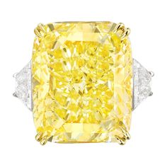 Radiate unparalleled elegance with this GIA Certified 10.05 Carat Fancy Yellow Radiant Cut Diamond Ring, adorned with trapezoid diamonds on the side. At the heart of this magnificent ring gleams a captivating cushion-cut diamond, certified by the esteemed Gemological Institute of America (GIA) for its exceptional quality. Despite being classified as Fancy Yellow, this diamond exudes a brilliance and warmth that is truly enchanting. With a Clarity Grade of VS2, the diamond showcases impeccable clarity, allowing light to dance through its facets with mesmerizing allure. Crafted with meticulous precision, the diamond displays Excellent Polish and Excellent Symmetry, ensuring each facet reflects light with stunning brilliance and precision. Enhanced by its none fluorescence, the diamond's natu Rings Fancy, Glitter Rocks, Fancy Yellow Diamond Ring, White Engagement Ring, Radiant Cut Diamond Ring, Jewelry Fancy, Yellow Diamond Ring, Canary Diamond, Yellow Ring