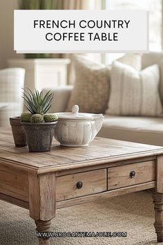 a coffee table with two plants on top and the words french country coffee table above it