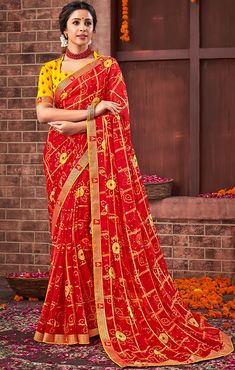 This Saree is Ready to Wear (With Fall and Pico Done). A designer saree in Red & Yellow color. It has intricate design all over the saree. This saree is a suitable amalgamation of style and grace that is required from an ethnic wear. The saree is ideal for any formal gathering. The saree comes with an unstitched blouse of corresponding color and design as shown in the picture. Georgette Designer Red & Yellow Color Saree Fabric Type: GeorgettePrimary Color: RedSecondary Color(s): - YellowSaree Le Festive Red Pre-draped Saree With Pallu, Festive Red Pre-draped Saree With Bandhani Print, Anarkali Pre-draped Red Saree For Navratri, Red Cutdana Pre-draped Saree For Navratri, Red Pre-draped Saree For Navratri, Bollywood Style Red Pre-draped Saree With Self Design, Red Saree With Unstitched Blouse For Navratri, Red Bandhani Print Pre-draped Saree In Art Silk, Red Semi-stitched Pre-draped Saree For Traditional Ceremonies