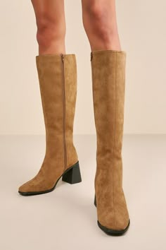 Step up your fall wardrobe game with a pair of boots that will elevate any lookâ€”the Marvari Taupe Suede Square-Toe Knee-High Boots! Soft faux suede shapes these ultra-trendy boots that feature a square-toe upper that rises to a 14.5"" knee-high shaft with a 16"" zipper at the instep and a 15.5"" circumference. A ready-for-anything block heel completes the chic design! Available in whole sizes only. 2. 75" stacked block heel. Lightly cushioned insole. Felted rubber sole has nonskid markings. Ma Fall Knee-high Boots With Suede Lining And Round Toe, Taupe Knee High Boots Outfit, Knee High Boots Suede, Suede Flat Boots, White Knee High Boots, Tall Heeled Boots, Snake Print Boots, Pointed Boots, White Ankle Boots