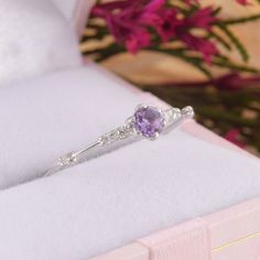 Womens Amethyst Promise Ring, Amethyst Silver Ring, Unique Promise Ring, Dainty Engagement Ring, Amethyst Jewelry, Silver Promise Ring WE OFFER UNLIMITED PERIOD INSTALLMENTS PLAN This is a beautiful, stunning, feminine ring that works well for all occasions, styles, and ages. You will love it! Ring information: Main stone: Amethyst Approximate size: 4.0mm Accent stones: Cubic zirconia Approximate size: 1.75mm (6 stones) Metal type: Silver Metal stamp: 925 sterling silver Installment Payments We Promise Rings Amethyst, Lavender Crystal Promise Ring, Dainty Purple Amethyst Ring, Purple Open Ring Birthstone Ring, Purple Birthstone Crystal Ring For Promise, Dainty Purple Amethyst Ring With Accent Stones, Lavender Amethyst Ring With Gemstone Accents As Gift, Lavender Amethyst Ring With Gemstone Accents, Lavender Crystal Birthstone Promise Ring