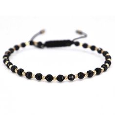 ✨Step into a world of sophistication with our exquisite Handcrafted Men's Bracelet, featuring glossy faceted black onyx beads and radiant 14K gold beads. This piece is a testament to luxury and refined taste, designed for the discerning man who values both style and substance. Gold Bracelet Key Features: ✅Craftsmanship: Each bracelet is meticulously handcrafted, boasting 4mm glossy faceted black onyx beads that catch the light perfectly, paired with 28 delicate 14K gold beads of 2.5mm, ensuring Luxury Adjustable Bracelets With Black Beads, Black Spiritual Bracelet With Faceted Beads, Spiritual Black Bracelets With Faceted Beads, Luxury Black Adjustable Beaded Bracelet, Luxury Adjustable Black Wristband, Luxury Adjustable Bracelet With Faceted Beads, Luxury Adjustable Bracelets With Faceted Beads, Luxury Black Onyx Beaded Bracelets, Luxury Black Hand-strung Beaded Bracelets