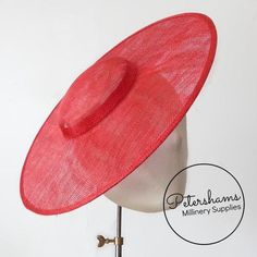 This poppy red cartwheel hat base is a classic shape that has sprung into popularity in the past year. Made from 2 layers of stiffened sinamay, these cartwheels are ready to trim and are fitted with a petersham ribbon on the inside crown edge. Simply add a comb or headband to secure to the head.Hat base measures:Width: 35.5cm (14 inches)Crown Width: 13.5cm (5.3 inches)Crown Height: Approximately 3.5cm (1.7 inches)For even more millinery supplies you can find us here:www.etsy.com/shop/PetershamsA Cartwheel Hat, Hat Making Supplies, Sinamay Fascinator, Blank Hats, Millinery Supplies, Hat Base, Fascinator Hat, Poppy Red, Millinery Hats